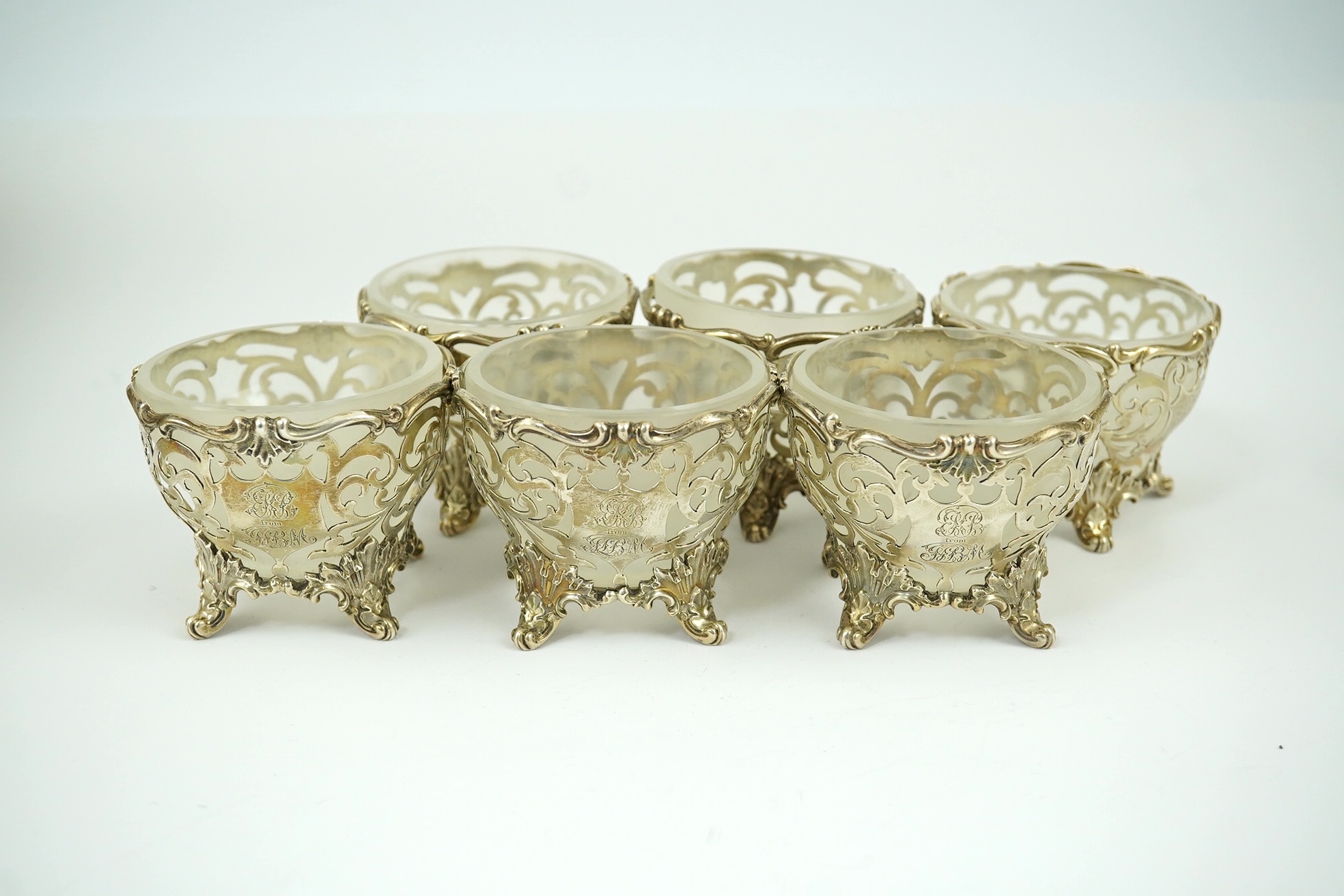 A set a six Victorian pierced silver circular sorbet dishes, with frosted glass liners, Edward & John Barnard